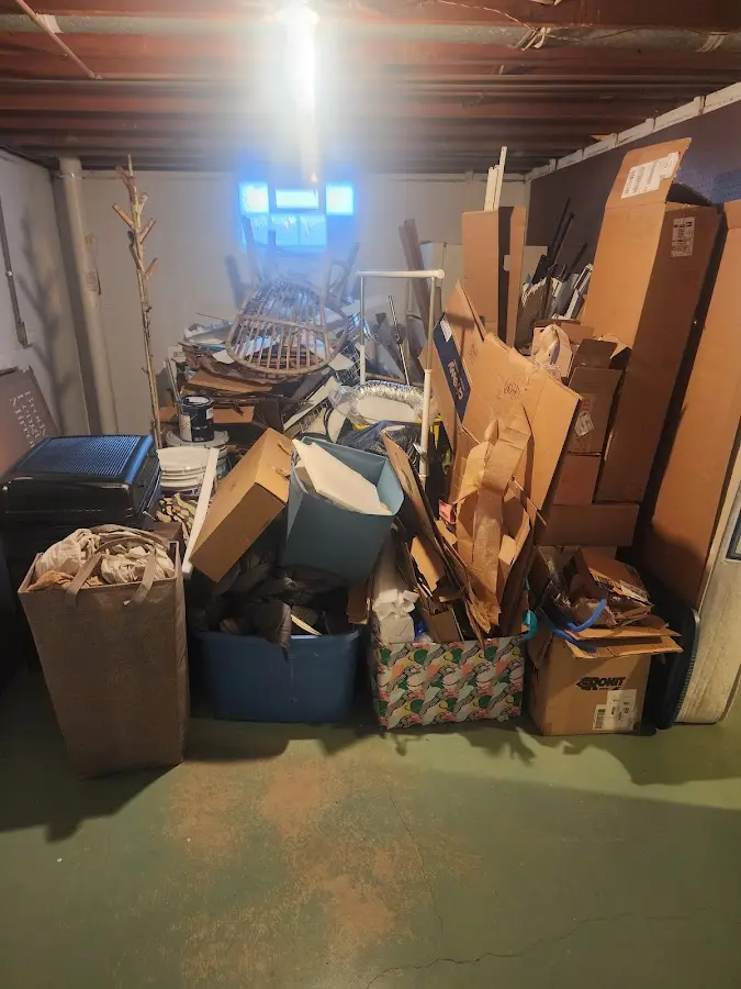 Roll-off dumpster container at job site for 2 Yard Dumpster Rental in North Baltimore